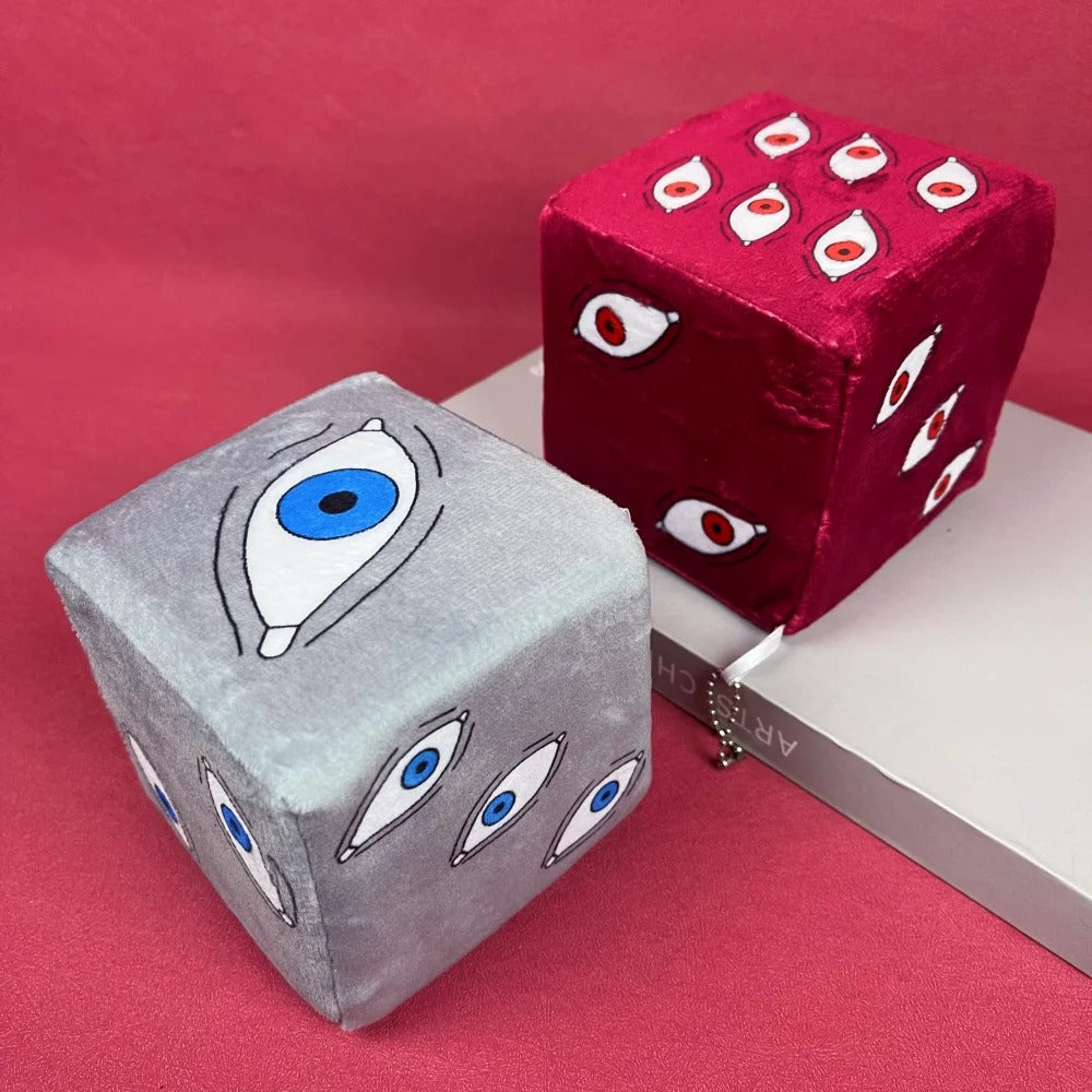Two dice-shaped plush toys with eye designs on a red background Jujutsu Kaisen Satoru Gojo Prison Realm Authentic Plush Sponge Cube Figures – 2-Piece Activated State Set