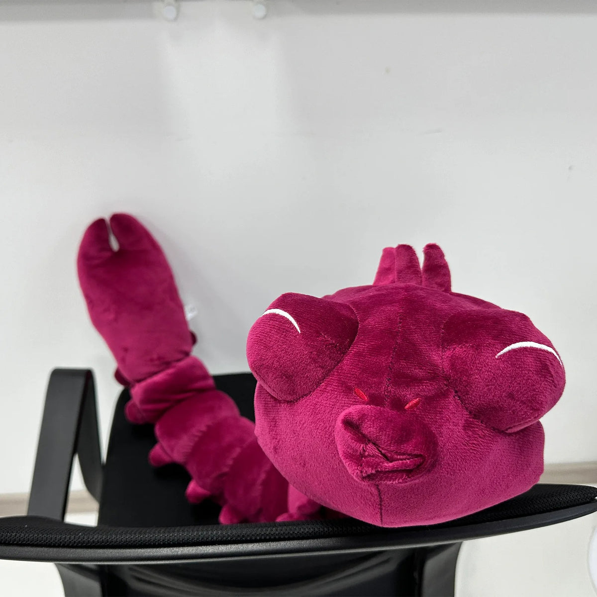 Plush lobster toy on a black chair against a white background Jujutsu Kaisen Toji Fushiguro Inventory Cursed Spirit Authentic Huggable Plush Doll – "Ugly Treasure" Special Grade Cosplay Companion & Room Decor Plush