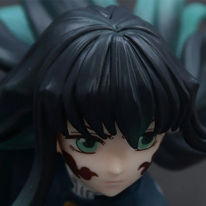 Close-up of a figurine with black hair and green eyes, wearing a dark outfit. Kotobukiya ARTFX J Demon Slayer: Kimetsu no Yaiba Muichiro Tokito Authentic 1/8 Scale Premium Statue Figure – Mist Hashira Edition