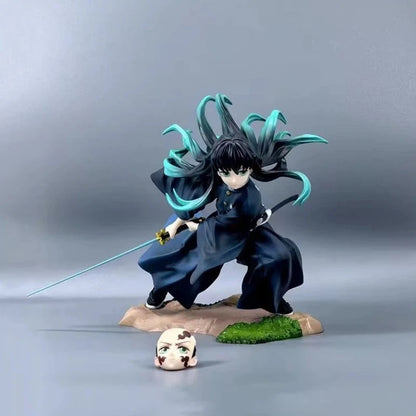 Figurine of a character with long black and teal hair, wearing a dark outfit, holding a sword on a gray background. Kotobukiya ARTFX J Demon Slayer: Kimetsu no Yaiba Muichiro Tokito Authentic 1/8 Scale Premium Statue Figure – Mist Hashira Edition