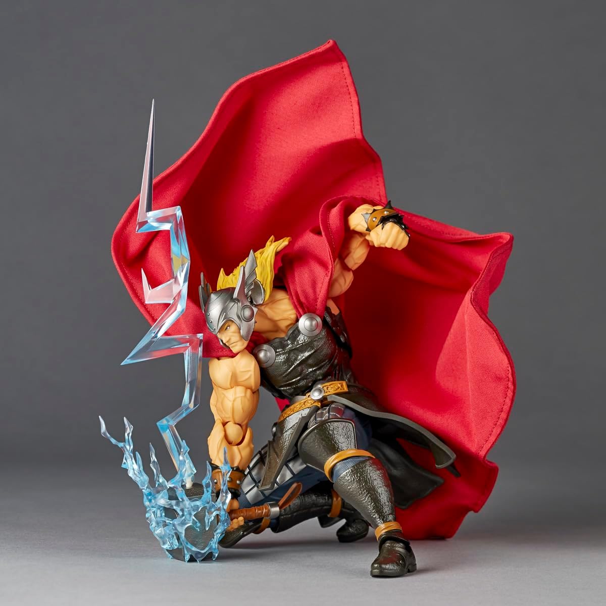 Thor action figure with red cape and hammer on gray background Marvel Amazing Yamaguchi Revoltech NR018 Thor Authentic Action Figure