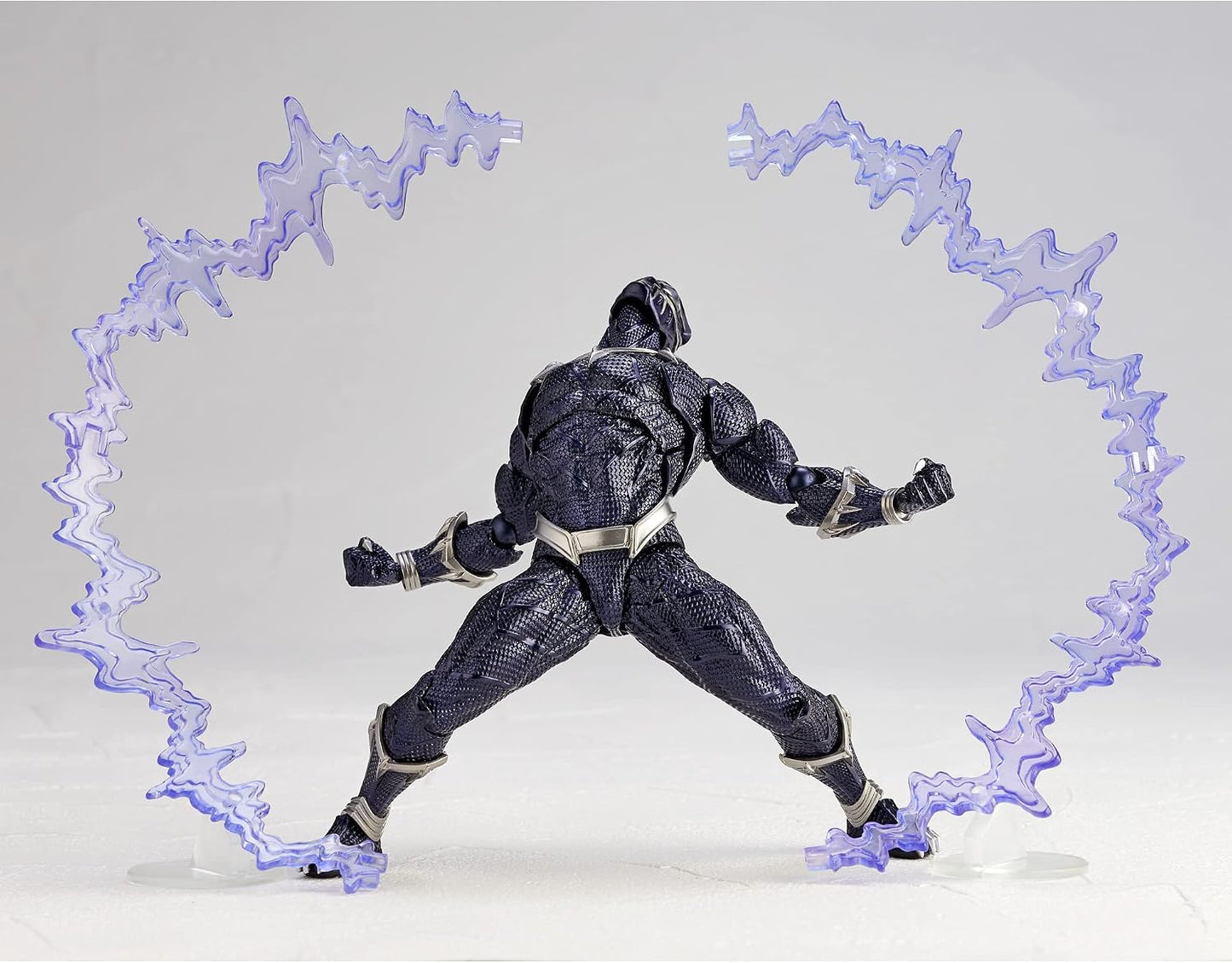 Action figure in dynamic pose with energy effects on a gray background Marvel Amazing Yamaguchi Revoltech No.030 Black Panther Authentic Action Figure