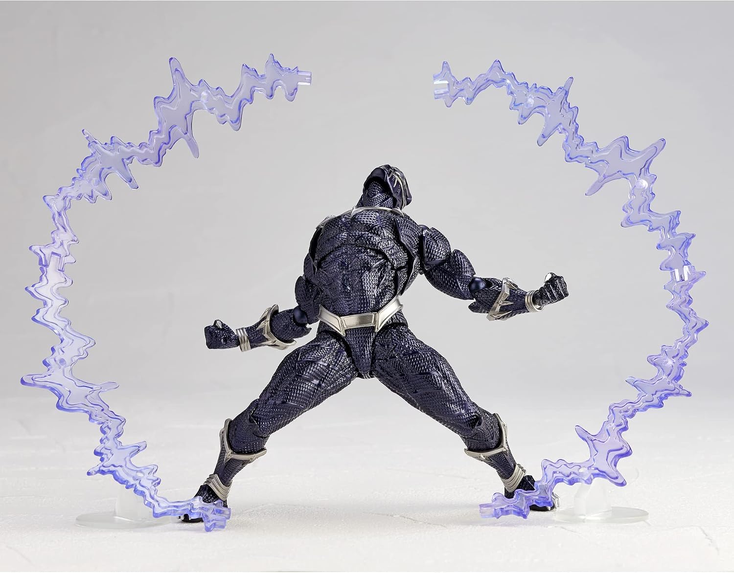 Action figure in dynamic pose with energy effects on a gray background Marvel Amazing Yamaguchi Revoltech No.030 Black Panther Authentic Action Figure