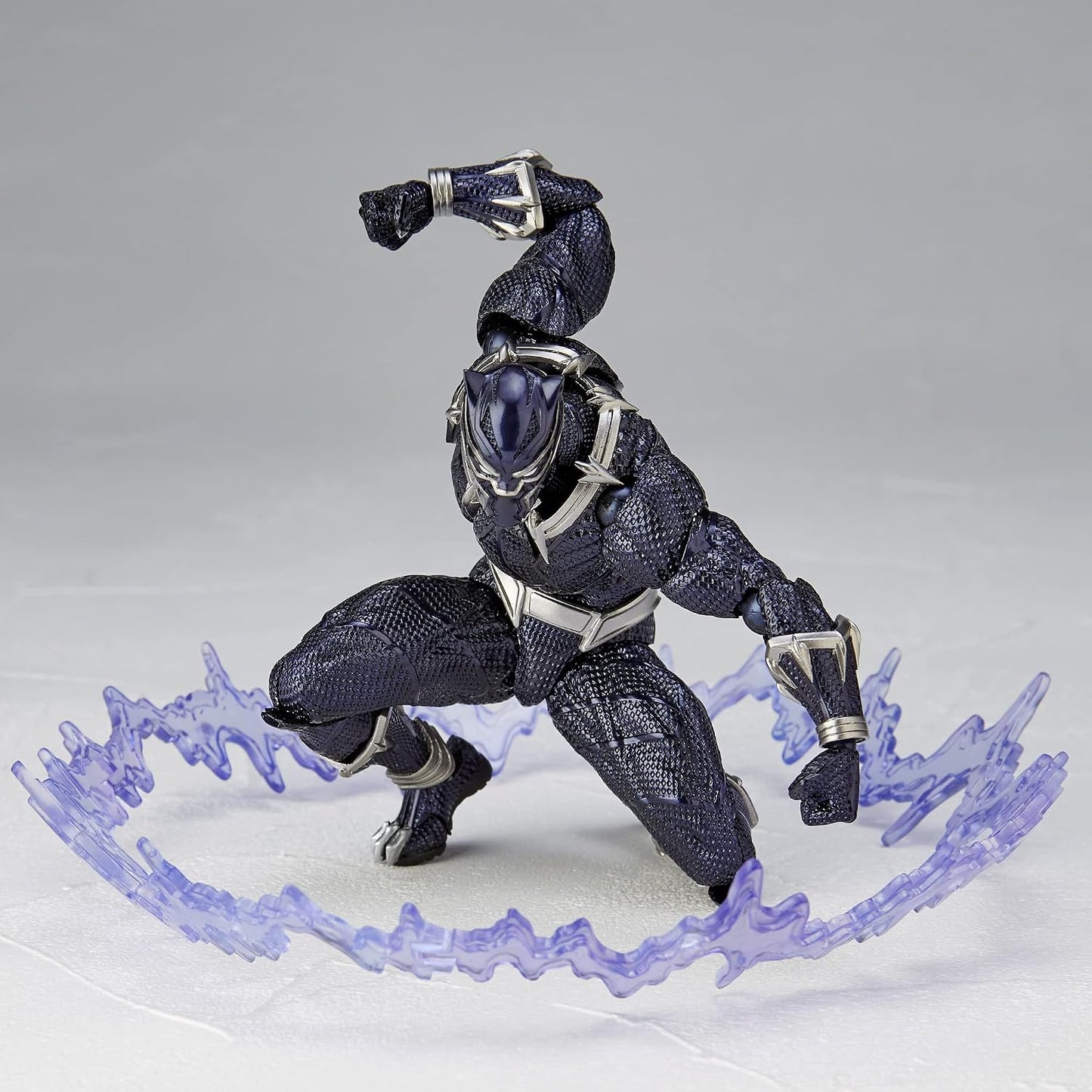 Action figure in black and silver costume with a glowing purple energy effect on a gray background Marvel Amazing Yamaguchi Revoltech No.030 Black Panther Authentic Action Figure