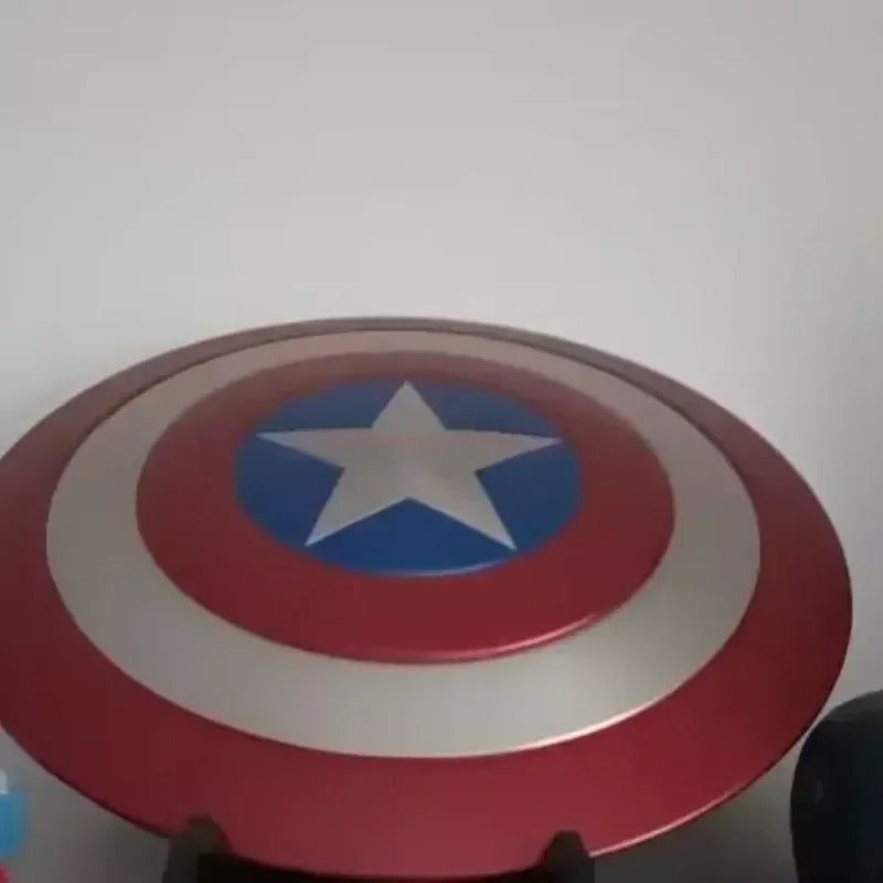 Red and blue circular object with a star in the center on a white background Marvel Captain America 47.5cm Full Metal Prop Replica Shield