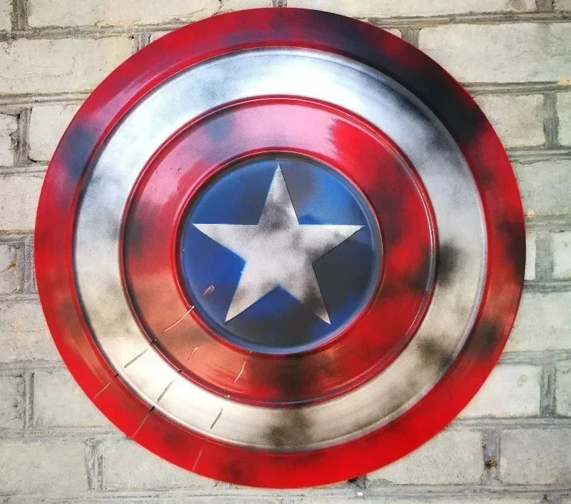 Red, blue, and silver shield with a star on a brick wall background Marvel Captain America 47.5cm Full Metal Prop Replica Shield