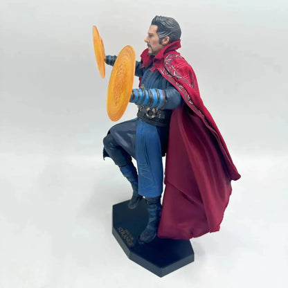 Superhero figurine with red cape and blue outfit holding orange discs on a white background Marvel Doctor Strange (Sorcerer Supreme Edition) 28cm Premium Figure by Crazy Toys