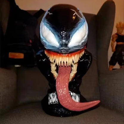 Venom toy figure with a long tongue on a couch Marvel Universe Venom 1:1 Scale Life-Size Premium Resin Collectible Bust