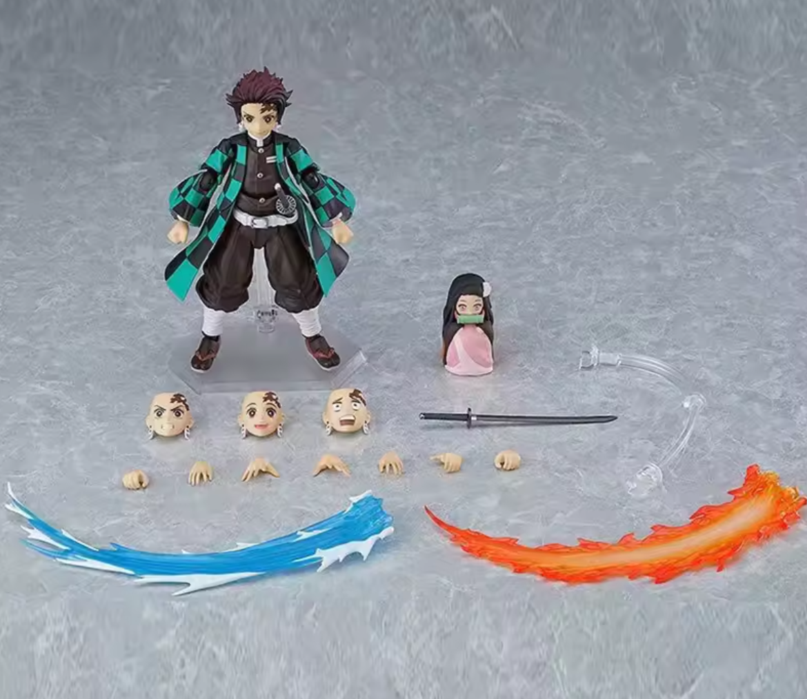 Action figure with accessories on a gray background Max Factory figma Demon Slayer: Kimetsu no Yaiba: Tanjiro Kamado Authentic Premium Articulated Action Figure – Deluxe DX Edition