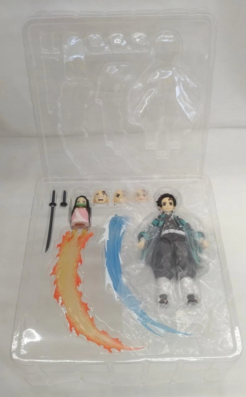 Action figure in packaging with accessories on a white background Max Factory figma Demon Slayer: Kimetsu no Yaiba: Tanjiro Kamado Authentic Premium Articulated Action Figure – Deluxe DX Edition