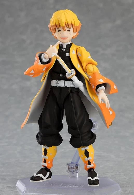 Action figure with orange hair and black outfit on a gray background Max Factory figma Demon Slayer: Kimetsu no Yaiba: Zenitsu Agatsuma Authentic Premium Action Figure – Deluxe DX Edition