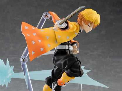 Action figure with orange cape and sword on a gray background Max Factory figma Demon Slayer: Kimetsu no Yaiba: Zenitsu Agatsuma Authentic Premium Action Figure – Deluxe DX Edition