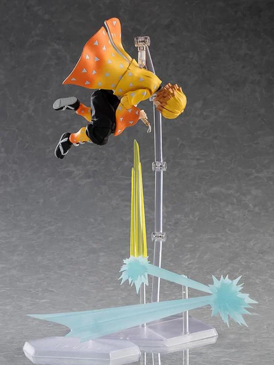 Action figure of a character in mid-air with a dynamic pose on a gray background Max Factory figma Demon Slayer: Kimetsu no Yaiba: Zenitsu Agatsuma Authentic Premium Action Figure – Deluxe DX Edition
