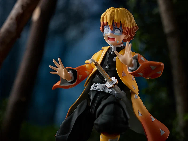 Action figure of an animated character with a sword in a forest setting Max Factory figma Demon Slayer: Kimetsu no Yaiba: Zenitsu Agatsuma Authentic Premium Action Figure – Deluxe DX Edition