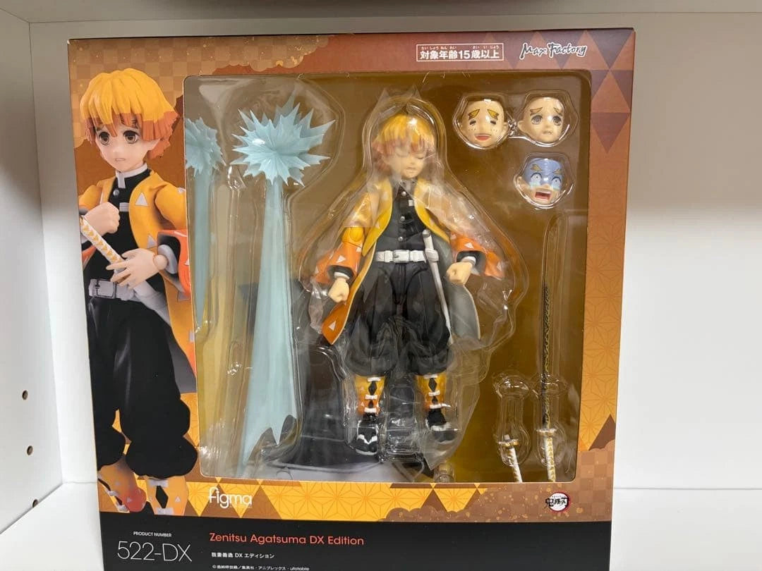 Action figure in packaging with character illustration on a white background Max Factory figma Demon Slayer: Kimetsu no Yaiba: Zenitsu Agatsuma Authentic Premium Action Figure – Deluxe DX Edition 9