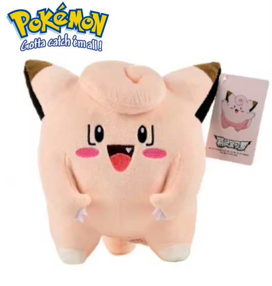 Plush toy of a cartoon character with a Pokémon logo above it on a white background Official Pokémon Clefairy Premium Cotton Plush by Titantoons – 8-Inch
