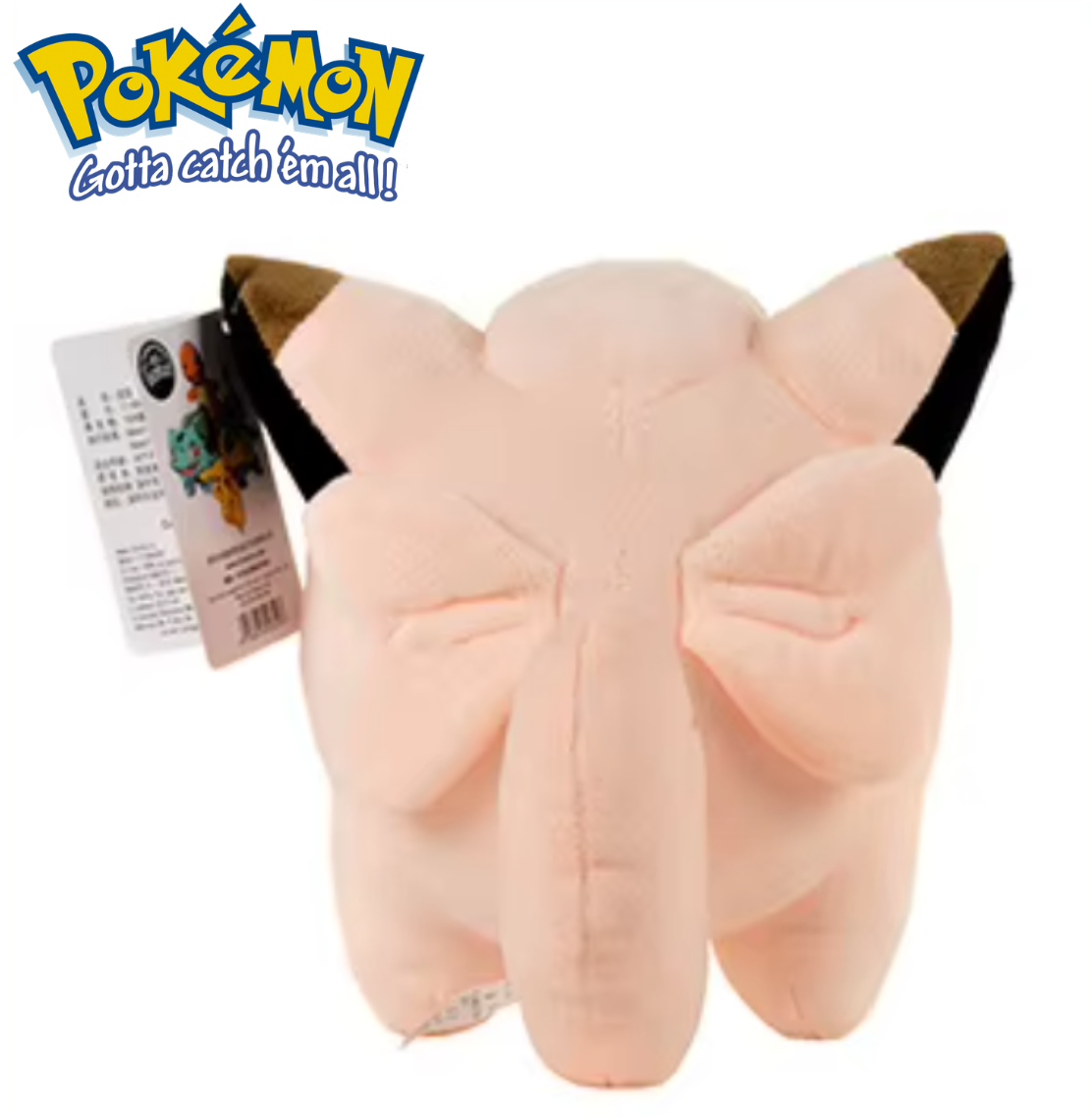 Plush toy with a tag on a white background, featuring the Pokémon logo. Official Pokémon Clefairy Premium Cotton Plush by Titantoons – 8-Inch