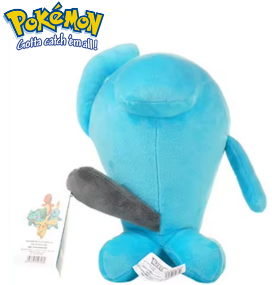 Blue plush toy with a gray patch, featuring the Pokémon logo on a white background. Official Pokémon Wobbuffet Premium Cotton Plush by Titantoons – 10-Inch