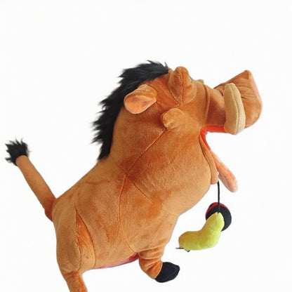A plush toy of Simba from The Lion King, shown in a dynamic leaping pose against a plain white background. The toy features orange-brown fur, a black mane, and is holding a small hanging toy in its mouth. Official The Lion King Pumbaa Premium Cotton Plush by Titantoons side