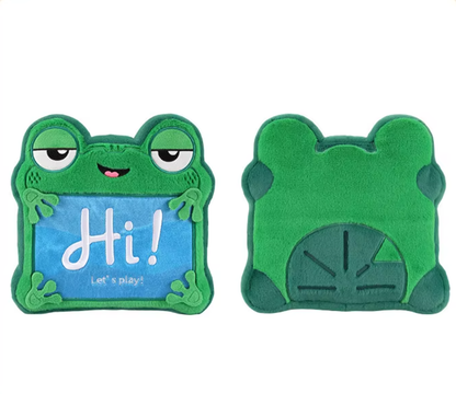 A green plush frog-shaped cushion shown from both the front and back. The front features cartoon eyes, a small smile, and a blue panel with the text 'Hi! Let's play!'. Official Toy Story & Playroom Friends Premium Cotton Plush Collection by Titantoons