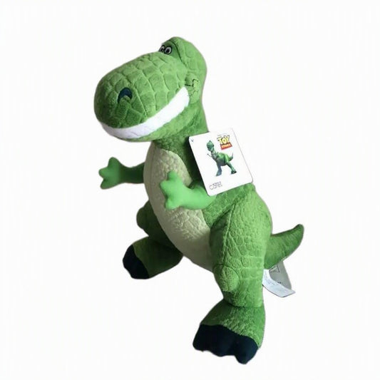 A green plush toy dinosaur resembling Buzz Lightyear from Toy Story, standing on a white background with a product tag attached to its front. Official Toy Story Rex Premium Cotton Plush by Titantoons