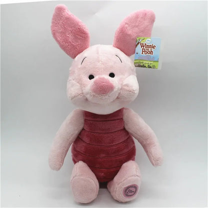 Plush toy of a character from 'Winnie the Pooh' on a white background. Official Winnie the Pooh & Friends Premium Cotton Plush Collection by Titantoons – Individual Storybook Characters or Complete 9-Piece Heirloom Nursery Set