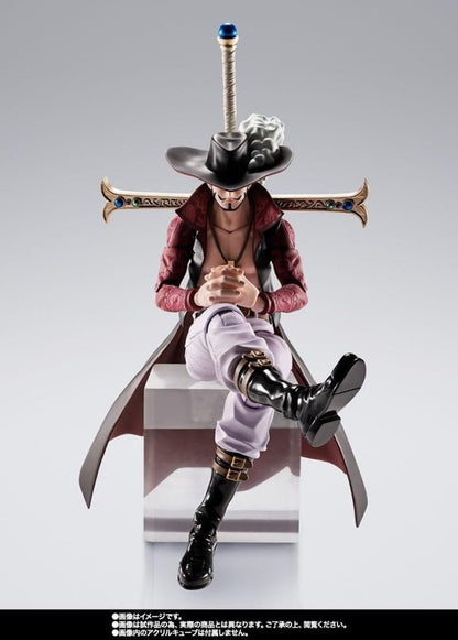 Action figure with a sword on a gray background One Piece: Dracule Mihawk (Hawk-Eye Ver.) Authentic S.H. Figuarts Fully Articulated Action Figure by Bandai Spirits