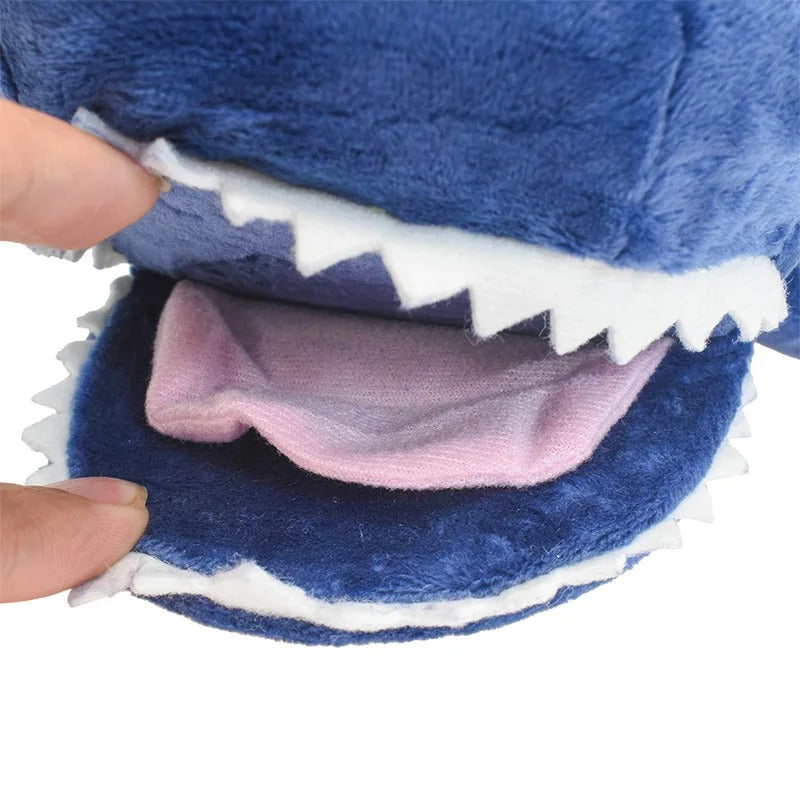 Close-up of a blue plush shark toy with a hand inside its mouth. One Piece: Island Whale Laboon Authentic 25cm Premium Plush Figure