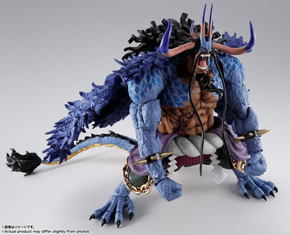 Action figure of a muscular character with blue scales and horns on a gray background One Piece: Kaido - King of the Beasts (Man-Beast Form) Authentic S.H. Figuarts Colossal Fully Articulated Action Figure by Bandai Spirits