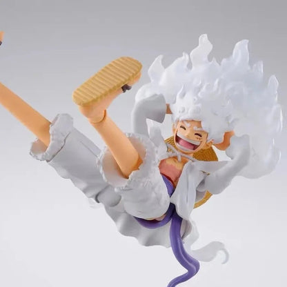 Action figure of a character with white hair and a yellow hat, holding a sword, on a gray background. One Piece: Monkey D. Luffy Gear 5 (Sun God Nika Ver.) Authentic S.H. Figuarts Fully Articulated Action Figure by Bandai Spirits