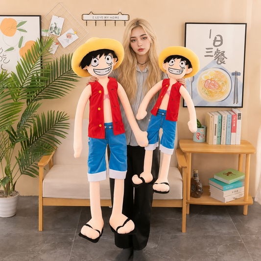 Person holding two large plush toys resembling characters from a popular anime series in a room with decor elements. One Piece: Monkey D. Luffy Giant Luxury Anime Plush