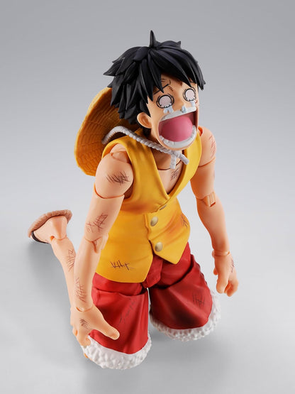 Action figure of a character in a yellow vest and red shorts with a straw hat on a gray background One Piece: Monkey D. Luffy (Summit War of Marineford Ver.) Authentic S.H. Figuarts Fully Articulated Action Figure by Bandai Spirits