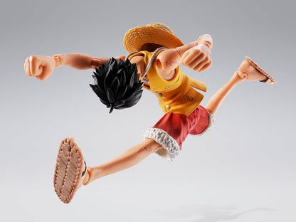 Action figure of a character in a dynamic pose on a gray background One Piece: Monkey D. Luffy (Summit War of Marineford Ver.) Authentic S.H. Figuarts Fully Articulated Action Figure by Bandai Spirits