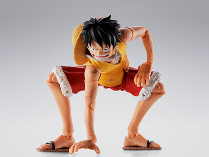 Action figure of a character in a dynamic pose on a gray background One Piece: Monkey D. Luffy (Summit War of Marineford Ver.) Authentic S.H. Figuarts Fully Articulated Action Figure by Bandai Spirits