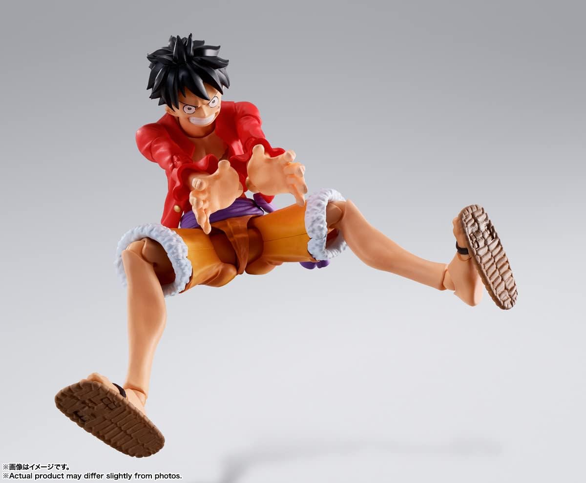 Action figure of a character in a dynamic pose on a gray background One Piece: Monkey D. Luffy (The Raid on Onigashima Ver.) Authentic S.H. Figuarts Fully Articulated Action Figure by Bandai Spirits