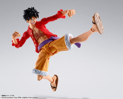 Action figure of a character in a dynamic pose on a gray background One Piece: Monkey D. Luffy (The Raid on Onigashima Ver.) Authentic S.H. Figuarts Fully Articulated Action Figure by Bandai Spirits