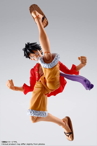 Action figure of a character in a dynamic pose on a gray background One Piece: Monkey D. Luffy (The Raid on Onigashima Ver.) Authentic S.H. Figuarts Fully Articulated Action Figure by Bandai Spirits