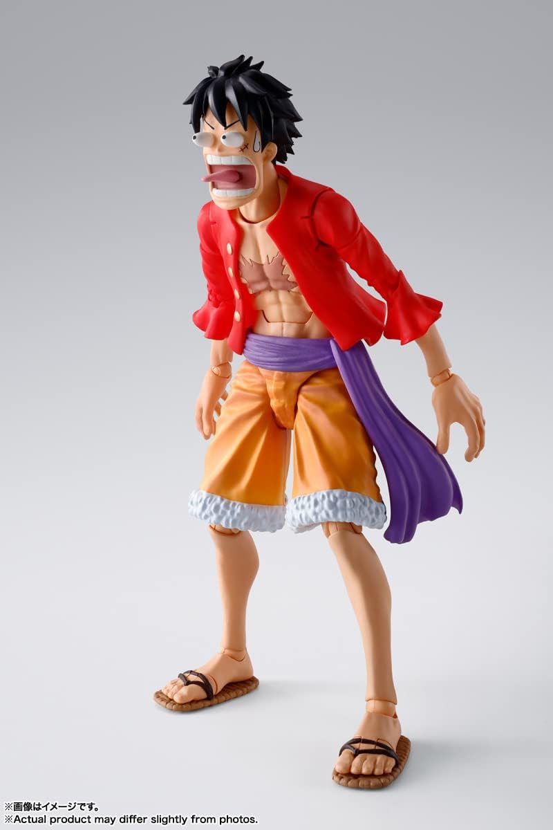 Action figure of a character in a red jacket and orange shorts on a white background One Piece: Monkey D. Luffy (The Raid on Onigashima Ver.) Authentic S.H. Figuarts Fully Articulated Action Figure by Bandai Spirits