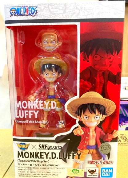 Action figure of Monkey D. Luffy from One Piece in packaging with branding visible One Piece: Monkey D. Luffy (WCF x S.H. Figuarts Ver.) Authentic Fully Articulated Chibi Action Figure by Bandai Spirits