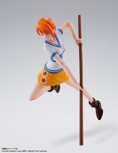 Figurine of a character from an anime or manga on a gray background One Piece: Nami (Romance Dawn Ver.) Authentic S.H. Figuarts Fully Articulated Action Figure by Bandai Spirits