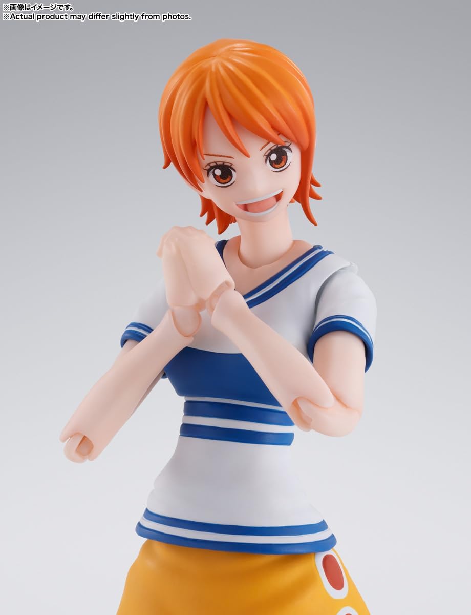 Figurine of a character with orange hair and a white and blue outfit on a gray background One Piece: Nami (Romance Dawn Ver.) Authentic S.H. Figuarts Fully Articulated Action Figure by Bandai Spirits