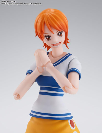 Figurine of a character with orange hair and a white and blue outfit on a gray background One Piece: Nami (Romance Dawn Ver.) Authentic S.H. Figuarts Fully Articulated Action Figure by Bandai Spirits