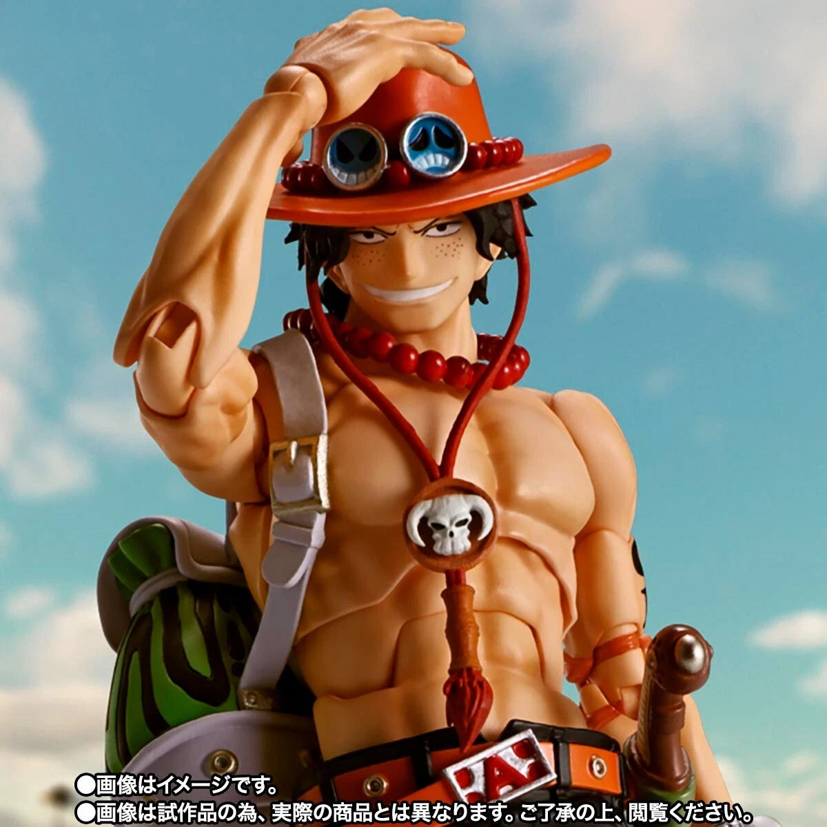 Action figure with a red hat and leather straps against a blue sky background One Piece: Portgas D. Ace Authentic S.H. Figuarts Fully Articulated Action Figure by Bandai Spirits