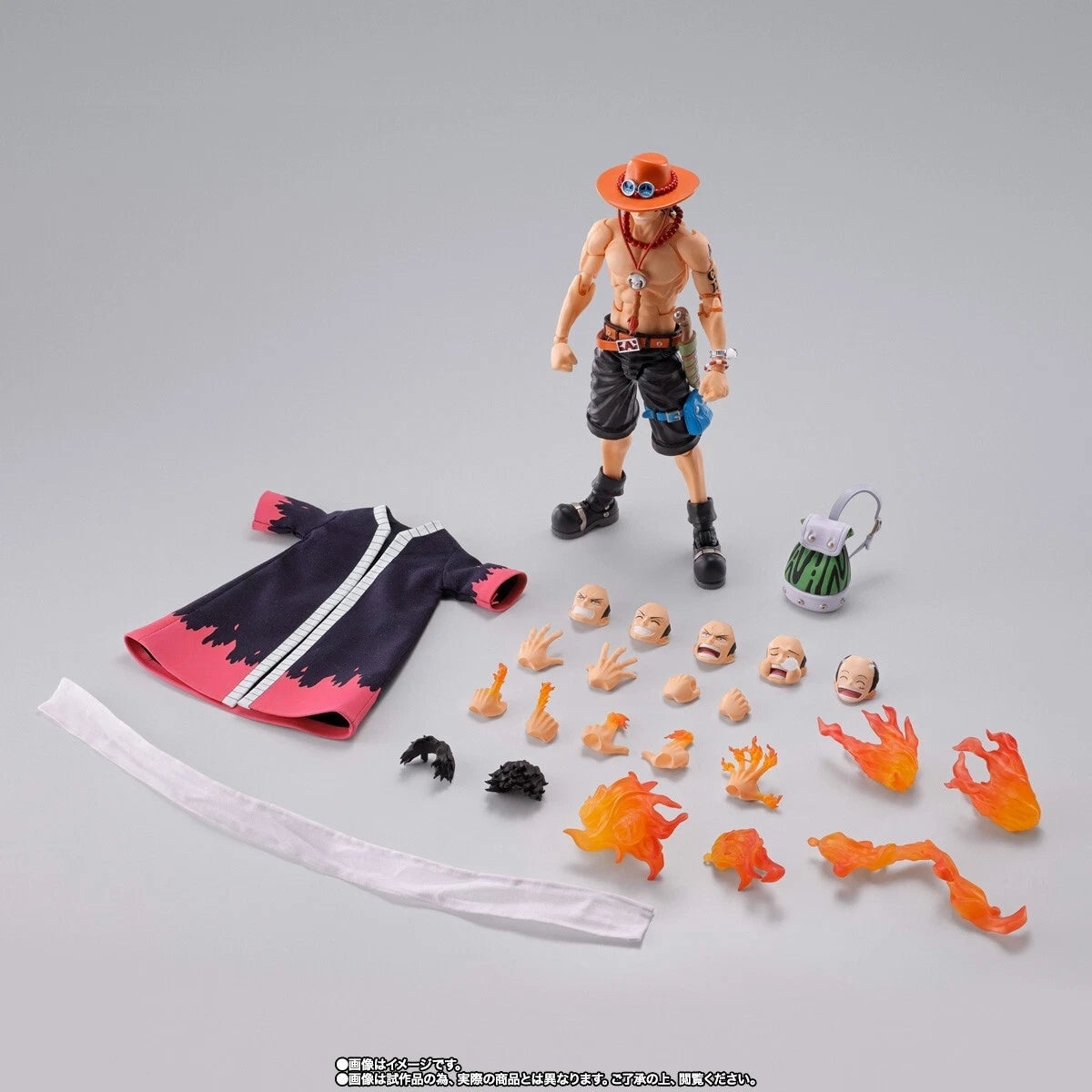 Action figure with interchangeable parts on a gray background One Piece: Portgas D. Ace Authentic S.H. Figuarts Fully Articulated Action Figure by Bandai Spirits