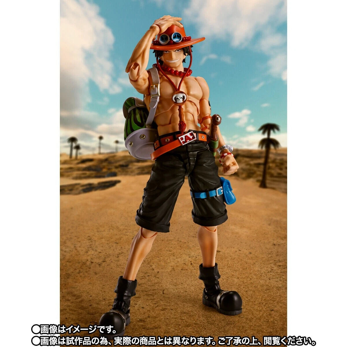 Action figure of a character from a popular anime series in a desert setting One Piece: Portgas D. Ace Authentic S.H. Figuarts Fully Articulated Action Figure by Bandai Spirits
