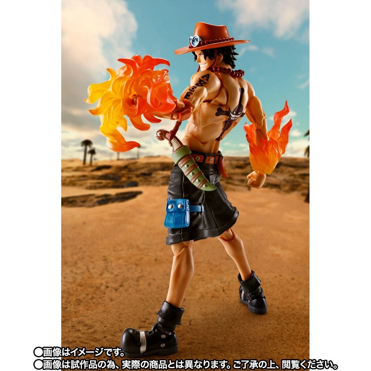 Action figure with fiery weapons in a desert setting One Piece: Portgas D. Ace Authentic S.H. Figuarts Fully Articulated Action Figure by Bandai Spirits