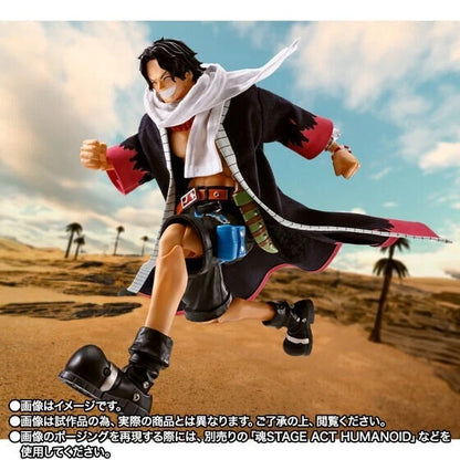 Action figure of a character in a desert setting with palm trees One Piece: Portgas D. Ace Authentic S.H. Figuarts Fully Articulated Action Figure by Bandai Spirits