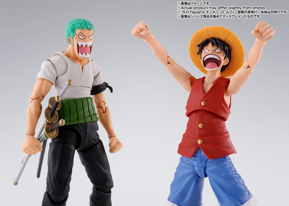 Two action figures of characters from a popular anime series on a gray background One Piece: Roronoa Zoro (Romance Dawn Ver.) Authentic S.H. Figuarts Fully Articulated Action Figure by Bandai Spirits