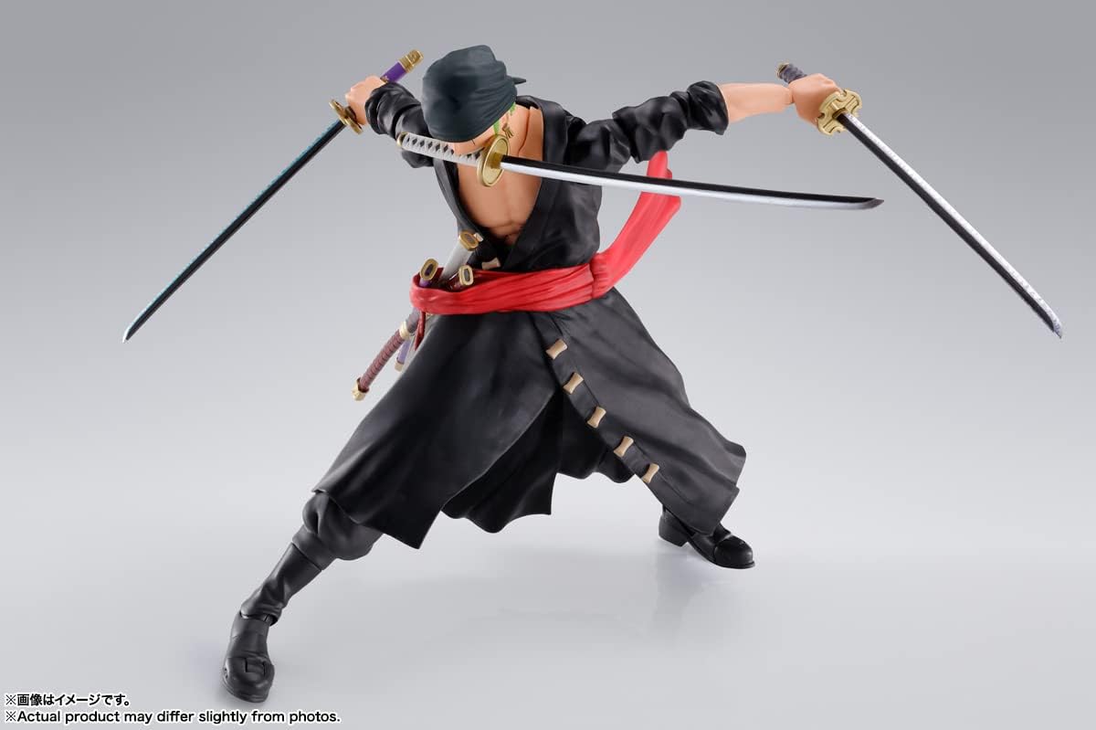 Action figure of a character in a dynamic pose with swords on a gray background One Piece: Roronoa Zoro (The Raid on Onigashima Ver.) Authentic S.H. Figuarts Fully Articulated Action Figure by Bandai Spirits
