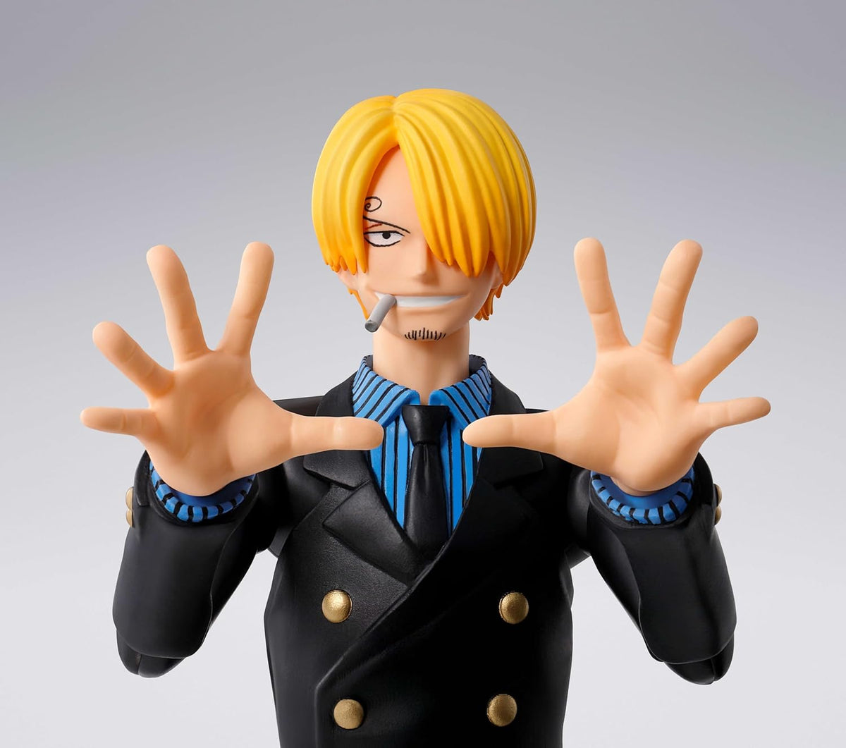 Figurine of a character with blonde hair and a black suit on a gray background One Piece: Sanji (Romance Dawn Ver.) Authentic S.H. Figuarts Fully Articulated Action Figure by Bandai Spirits